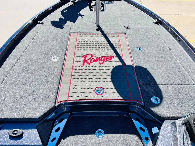Slide: The Image of 2025 Ranger Z520R Cup-Equipped boat deck with logo and textured surface. - 17