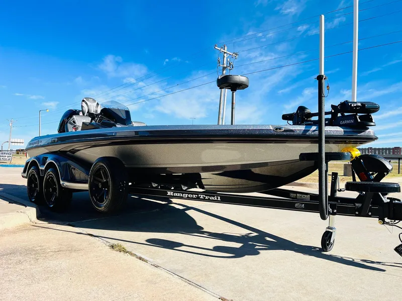 Slide: The Image of 2025 Ranger Z520R Cup-Equipped boat on trailer under clear blue sky. - 2