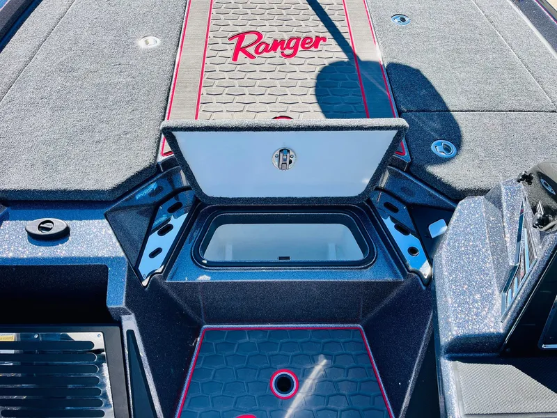 Slide: The Image of 2025 Ranger Z520R Cup-Equipped boat interior with storage compartment open. - 26