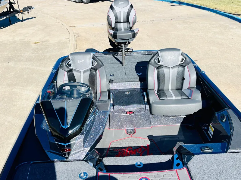 Slide: The Image of 2025 Ranger Z520R Cup-Equipped boat interior with modern seating and steering wheel. - 28