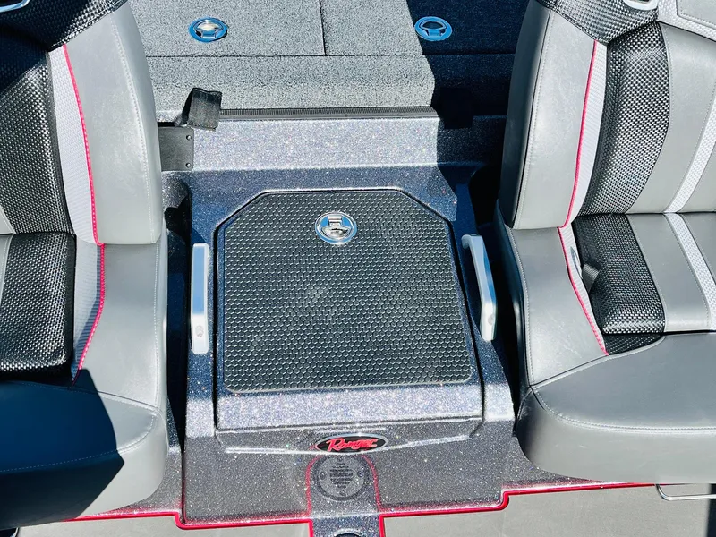 Slide: The Image of 2025 Ranger Z520R Cup-Equipped boat interior with sleek seating and storage compartment. - 33