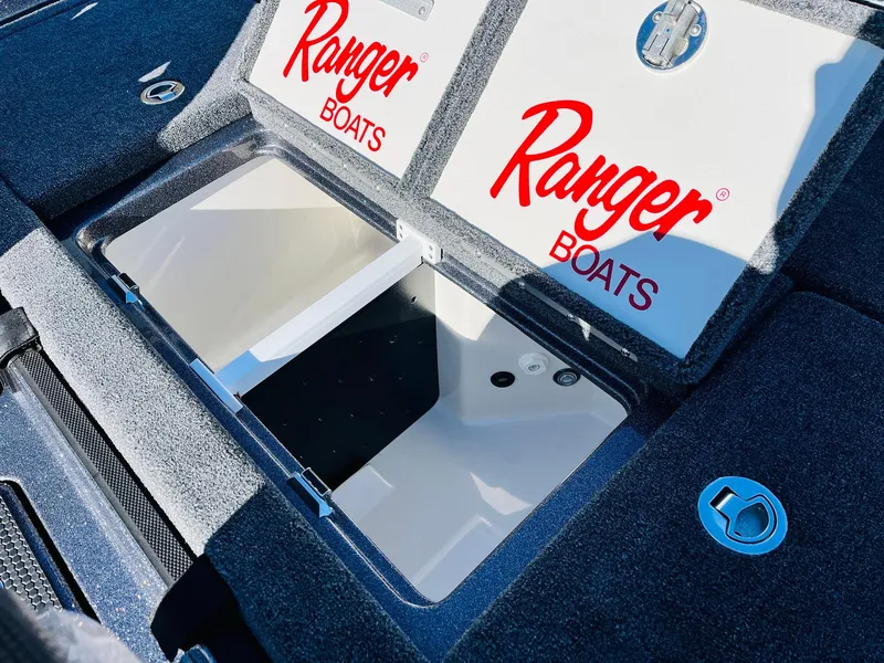 Slide: The Image of 2025 Ranger Z520R Cup-Equipped boat storage compartments with Ranger Boats branding. - 40