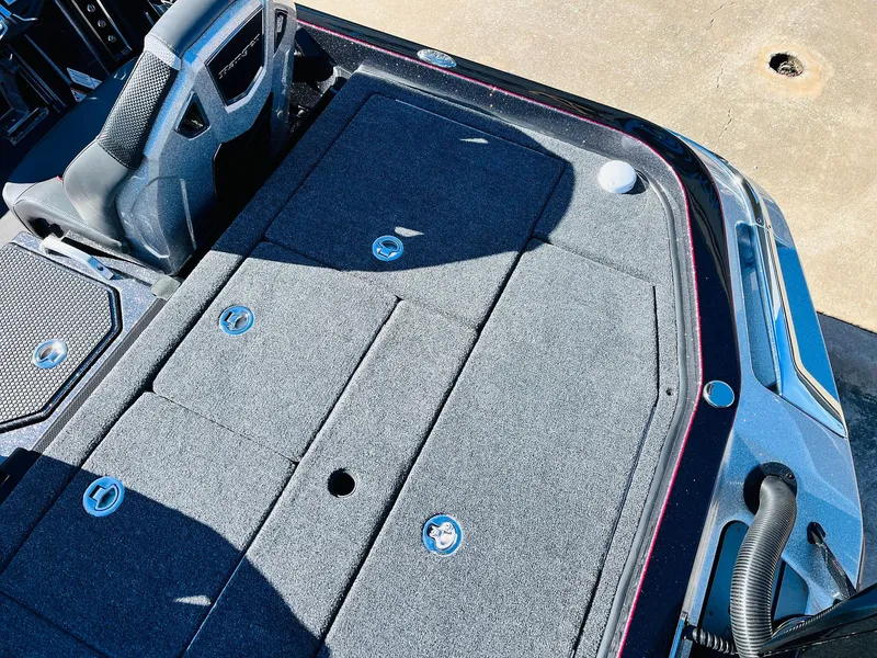Slide: The Image of 2025 Ranger Z520R Cup-Equipped boat deck with storage compartments and seating. - 44
