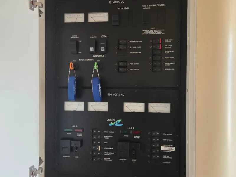 Slide: The Image of Electrical control panel on a 1998 Sea Ray 400 Sundancer boat. - 40