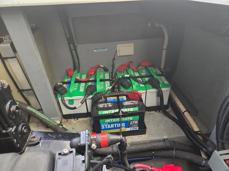 Slide: The Image of Battery compartment of a 1998 Sea Ray 400 Sundancer with Interstate batteries. - 45