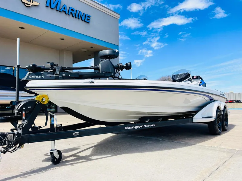Slide: The Image of 2025 Ranger Z521R Cup-Equipped boat on trailer, parked outside marine dealership. - 3