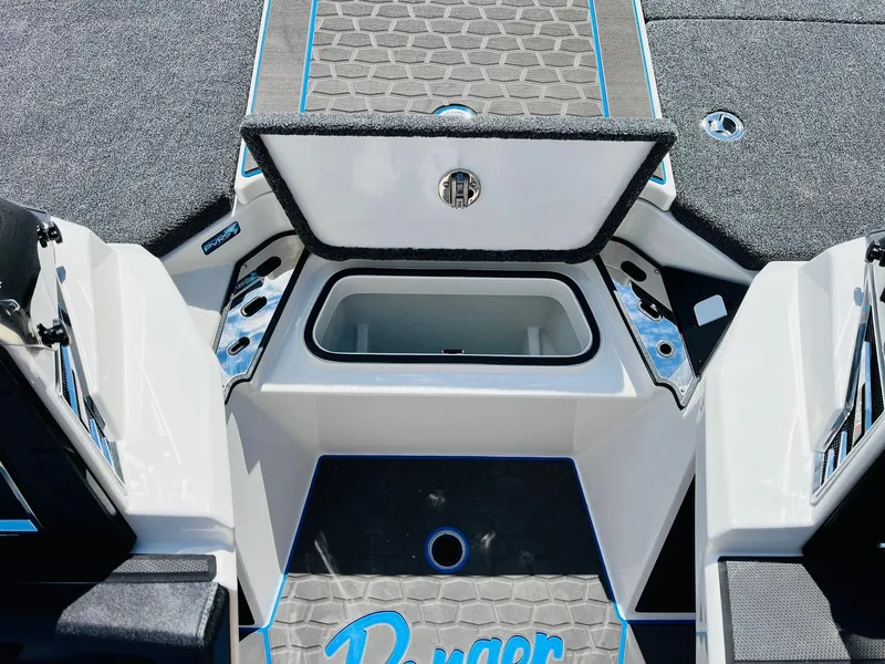 Slide: The Image of 2025 Ranger Z521R Cup-Equipped boat interior with open storage compartment. - 30
