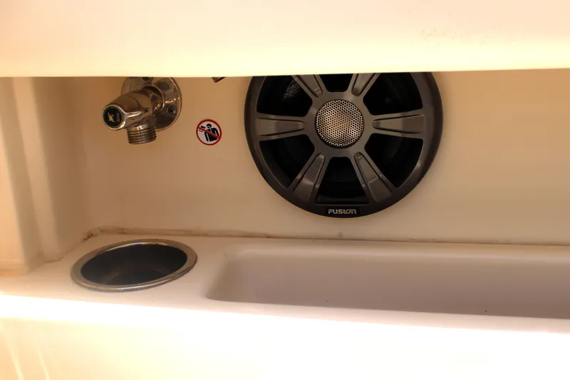 Slide: The Image of 2019 Grady-White Freedom 275 boat interior with speaker and sink detail. - 22