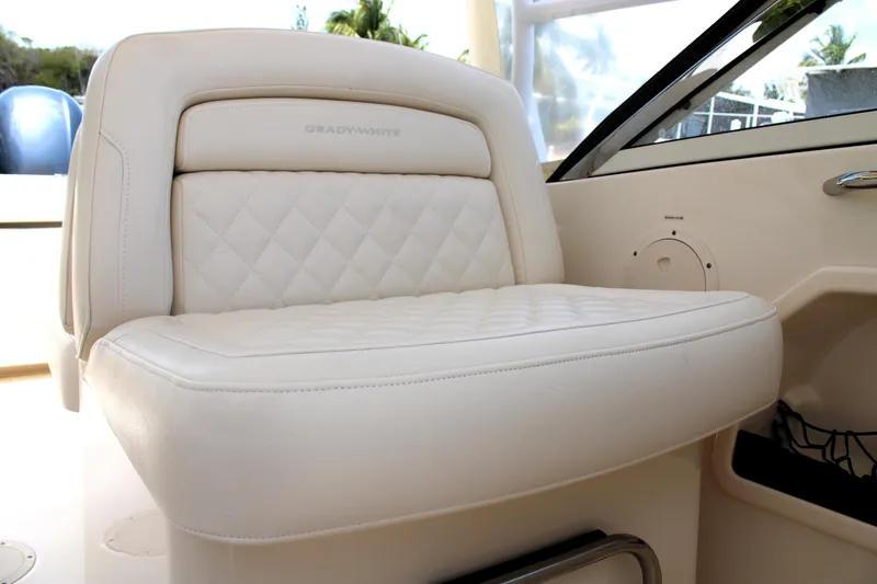 Slide: The Image of Luxurious seating on 2019 Grady-White Freedom 275 boat, featuring quilted upholstery. - 29