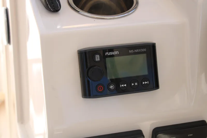 Slide: The Image of Fusion MS-NRX300 marine stereo on 2019 Grady-White Freedom 275 boat console. - 33