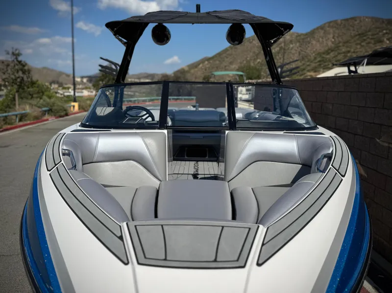 Slide: The Image of 2021 Moomba Craz boat with sleek design, spacious seating, and modern features. - 14