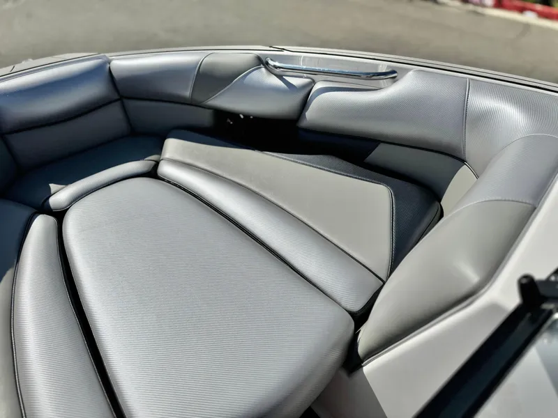 Slide: The Image of 2021 Moomba Craz boat interior with sleek, gray leather seating. - 17