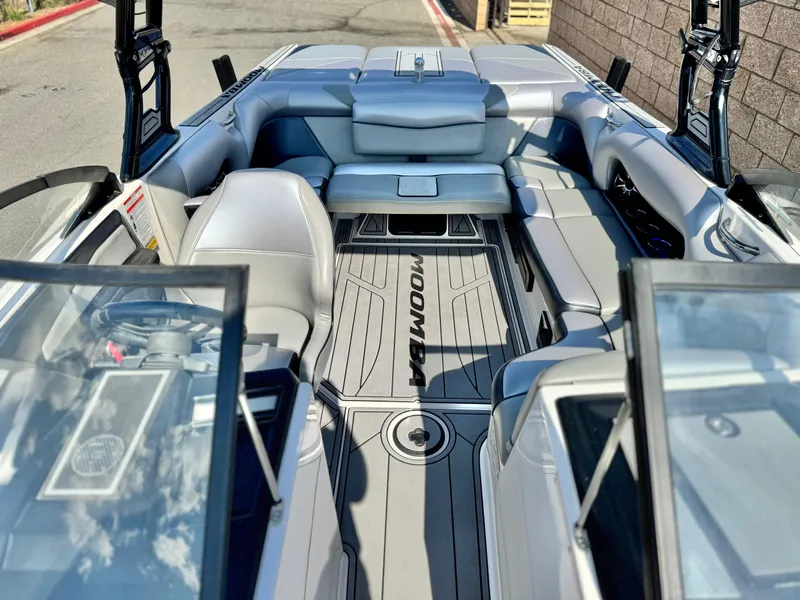 Slide: The Image of 2021 Moomba Craz boat interior with sleek seating and modern design. - 18