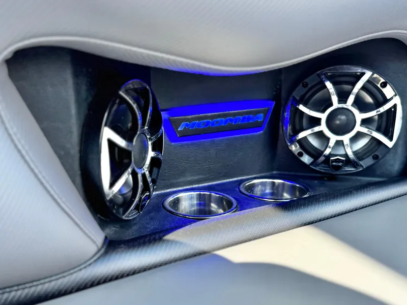 Slide: The Image of 2021 Moomba Craz interior speakers with illuminated logo and cup holders. - 26