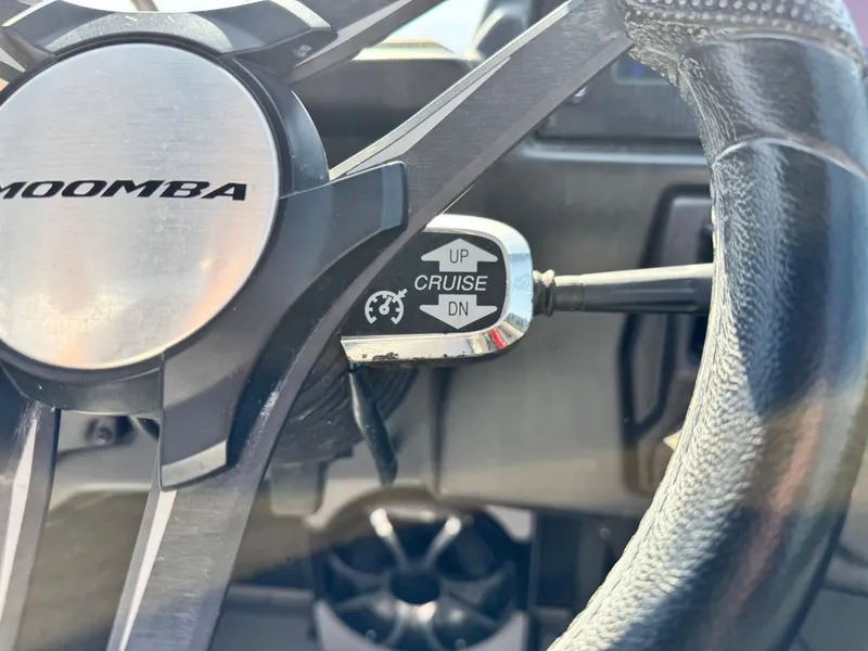 Slide: The Image of Steering wheel of 2021 Moomba Craz with cruise control lever. - 33