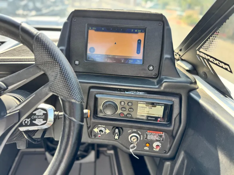 Slide: The Image of 2021 Moomba Craz dashboard with navigation and control panel. - 34