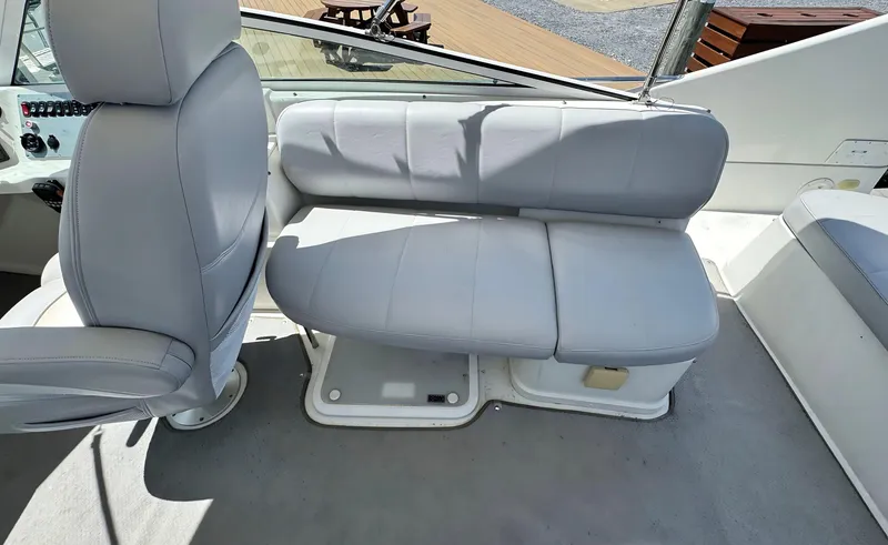 Slide: The Image of 2008 Carver 36 Mariner boat interior with gray seating and helm chair. - 35