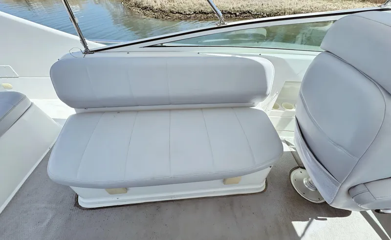 Slide: The Image of 2008 Carver 36 Mariner boat interior with white seating and water view. - 39