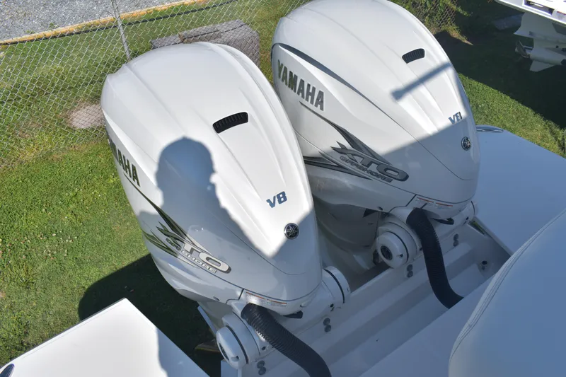 Slide: The Image of Twin Yamaha V8 outboard engines on a 2023 Regal 36 XO boat. - 14