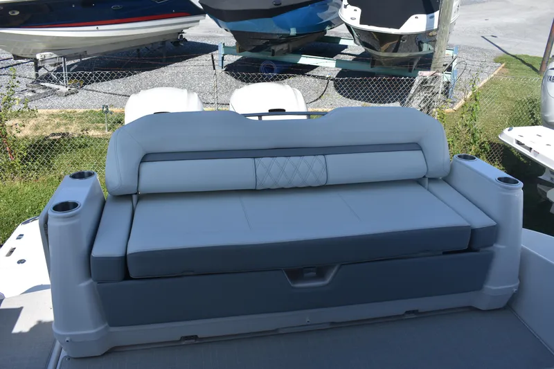 Slide: The Image of 2023 Regal 36 XO boat with a sleek, modern seating area. - 19