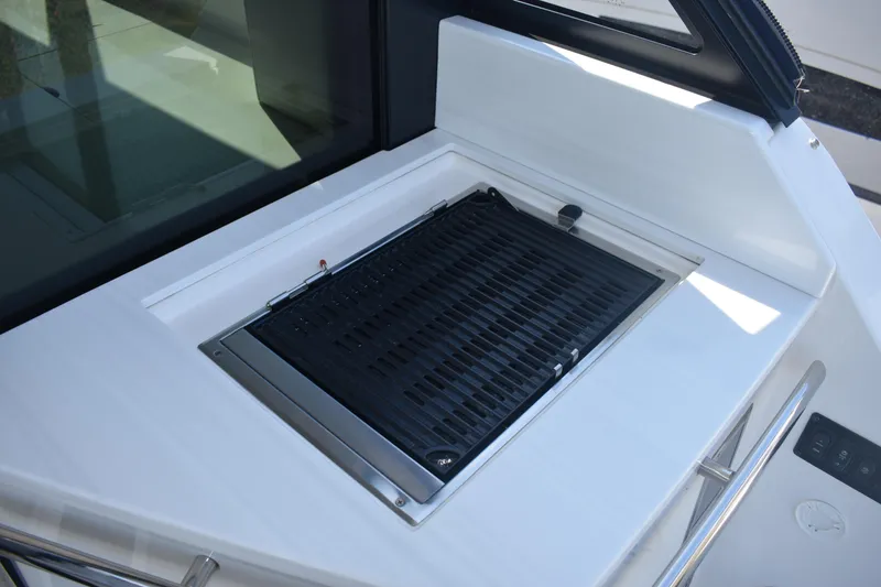 Slide: The Image of Outdoor grill on 2023 Regal 36 XO yacht deck. - 28