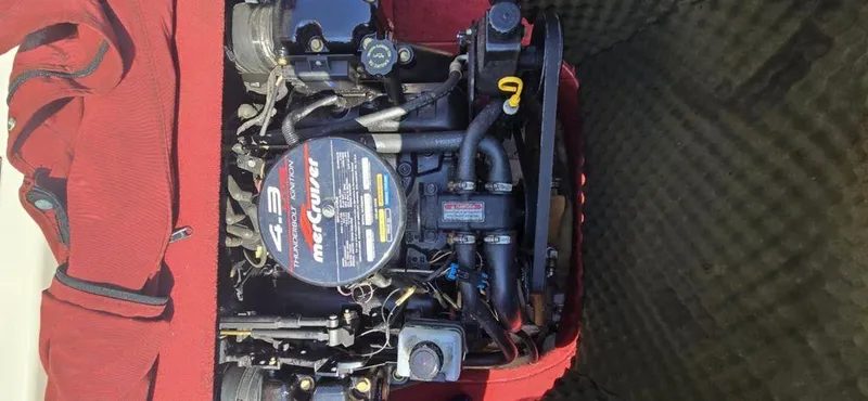 Slide: The Image of Engine of a 1999 Sea Ray 185 Bow Rider boat with MerCruiser components. - 10
