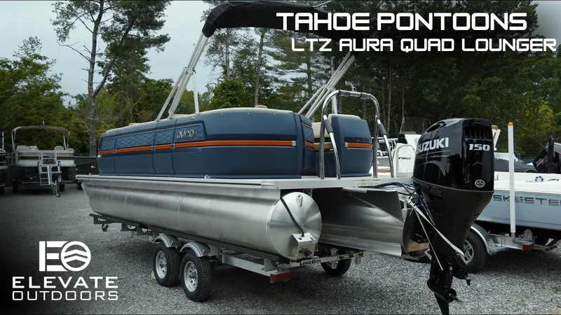 The Image of 2025 Tahoe Pontoon Aura 2185 Quad Lounger Triple on trailer, featuring Suzuki 150 engine. - 0