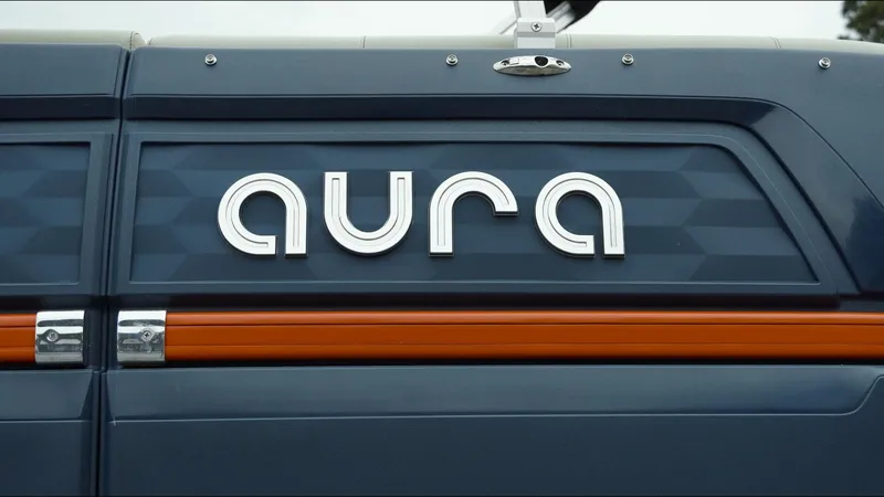 Slide: The Image of 2025 Tahoe Pontoon Aura 2185 Quad Lounger Triple logo on a sleek, modern design. - 22