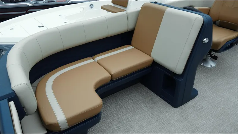 Slide: The Image of 2025 Tahoe Pontoon Aura 2185 Quad Lounger Triple with beige and tan seating. - 7