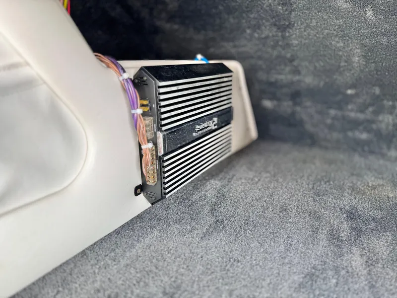 Slide: The Image of Amplifier installed in a 2005 Eliminator Eagle 230 XP boat interior. - 19