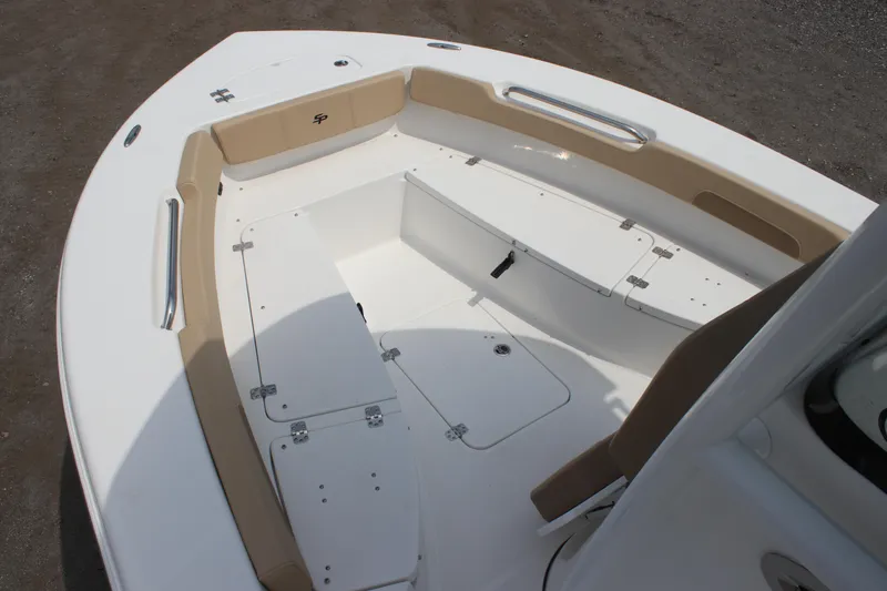 Slide: The Image of 2025 Sea Pro 202 CC boat interior with seating and storage compartments. - 12