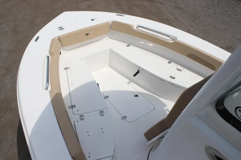 Slide: The Image of 2025 Sea Pro 202 CC boat interior with spacious seating and storage compartments. - 13