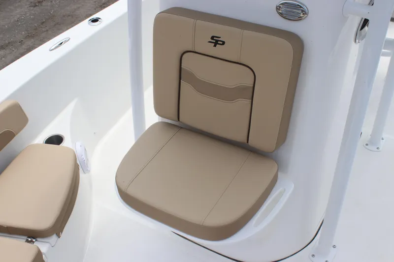 Slide: The Image of 2025 Sea Pro 202 CC boat seat with beige upholstery and SP logo. - 16
