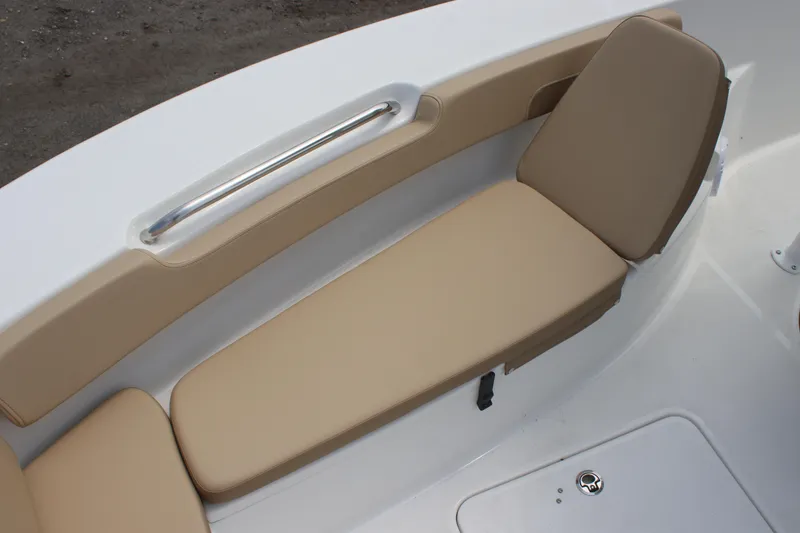 Slide: The Image of 2025 Sea Pro 202 CC boat interior with beige cushioned seating. - 20