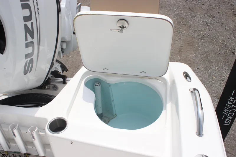 Slide: The Image of 2025 Sea Pro 202 CC boat with open livewell and Suzuki engine. - 36