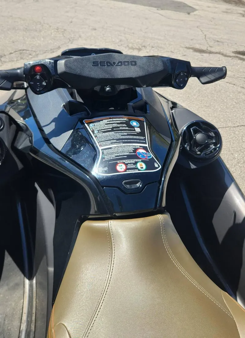 Slide: The Image of 2023 Sea-Doo GTX 170 SS iDF jet ski, black and gold seat, dashboard view. - 5