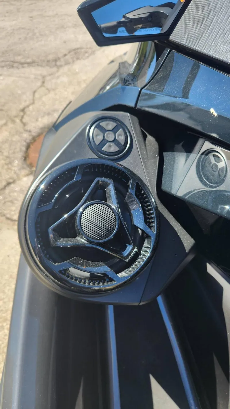 Slide: The Image of 2023 Sea-Doo GTX 170 SS iDF dashboard with speaker and controls. - 7