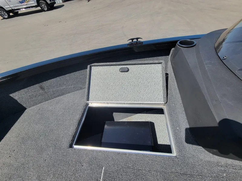 Slide: The Image of 2023 Crestliner 1750 Fish Hawk SE SC boat storage compartment open on deck. - 21