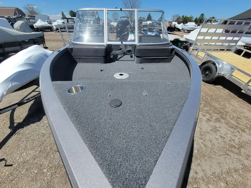 Slide: The Image of 2023 Crestliner 1750 Fish Hawk SE WT boat, spacious deck, windshield, outdoor display. - 10