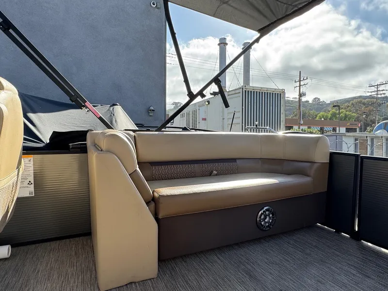 Slide: The Image of 2023 Godfrey SWEETWATER 2286 SB pontoon boat with beige seating and canopy. - 30