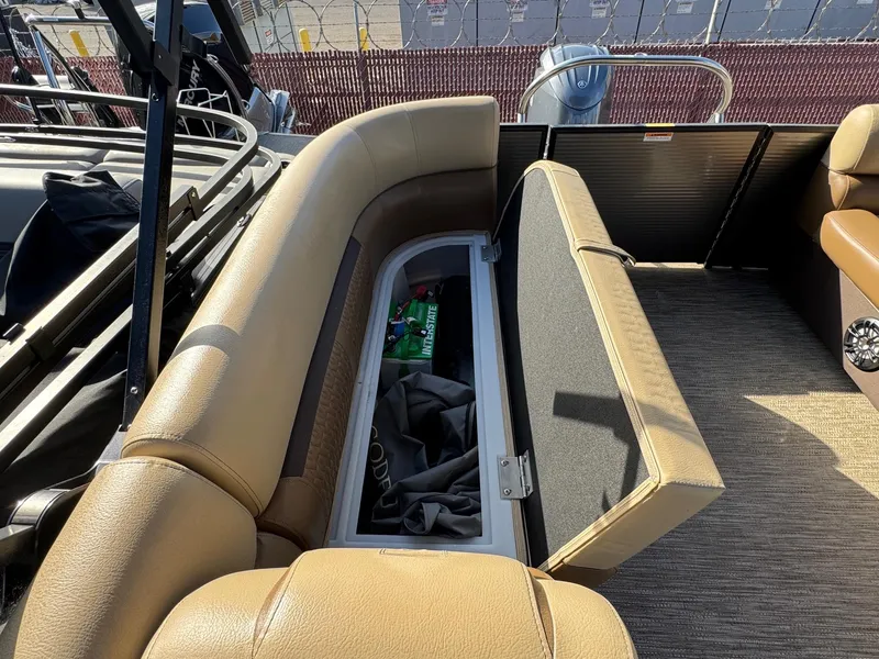 Slide: The Image of 2023 Godfrey SWEETWATER 2286 SB boat interior with open storage compartment. - 33