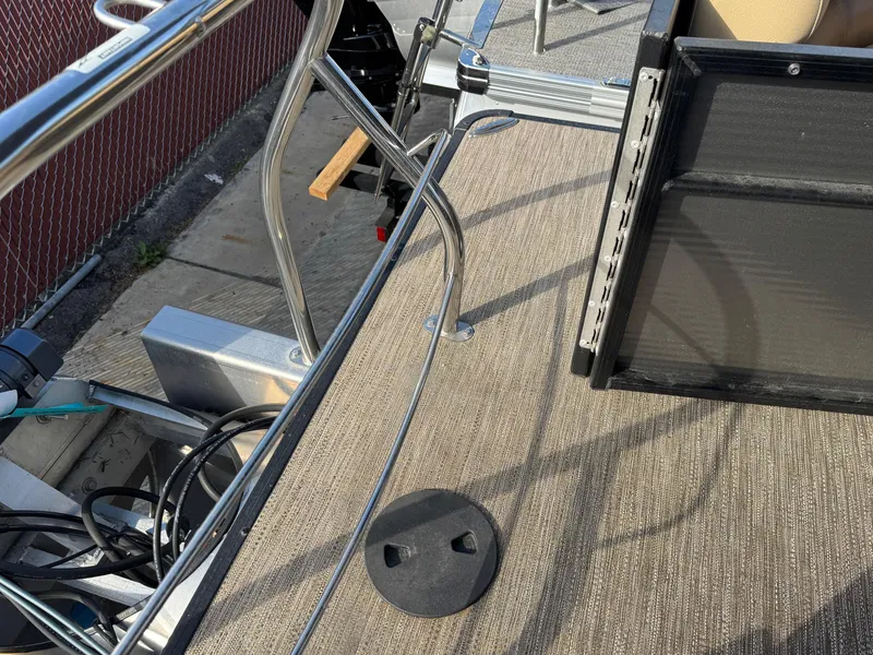 Slide: The Image of 2023 Godfrey SWEETWATER 2286 SB boat deck with railing and seating area. - 36