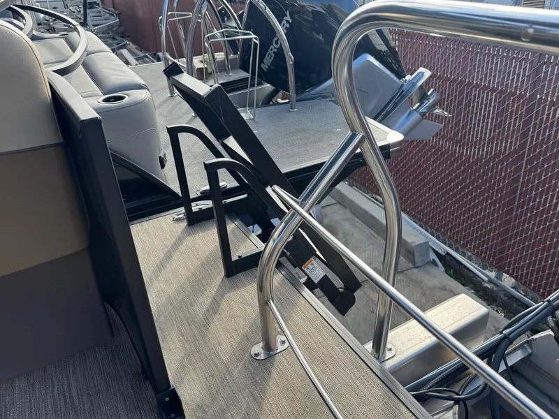 Slide: The Image of 2023 Godfrey SWEETWATER 2286 SB boat deck with railing and seating area. - 37