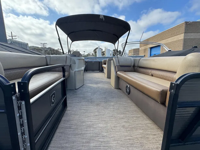 Slide: The Image of 2023 Godfrey SWEETWATER 2286 SB pontoon boat with spacious seating and canopy. - 5