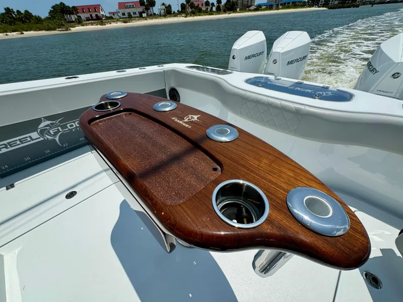 Slide: The Image of Luxury fishing boat with wooden tackle station, Freeman 38, 2024 model, on water. - 36