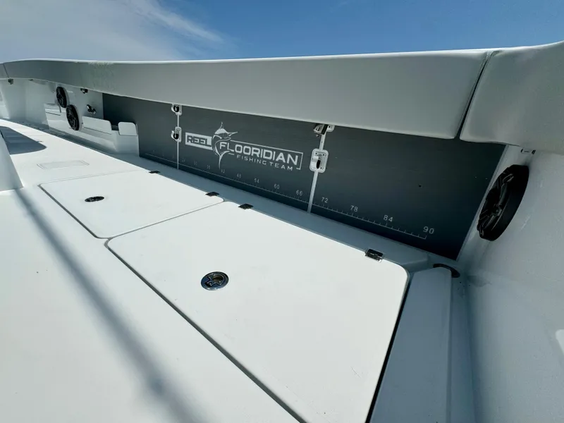 Slide: The Image of 2024 Freeman 38 boat deck with storage compartments and measurement markings. - 40