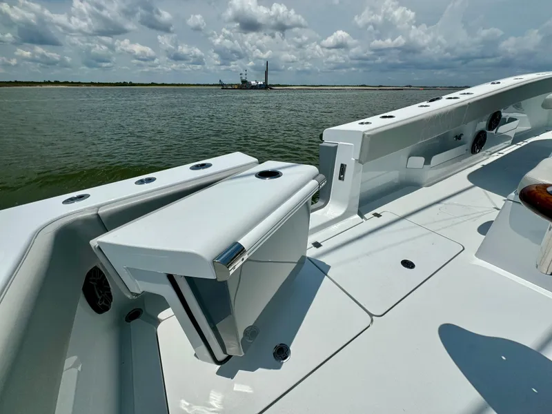 Slide: The Image of 2024 Freeman 38 boat deck with open water view under cloudy sky. - 43