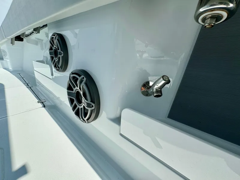 Slide: The Image of 2024 Freeman 38 boat interior with speakers and stainless steel fixtures. - 48