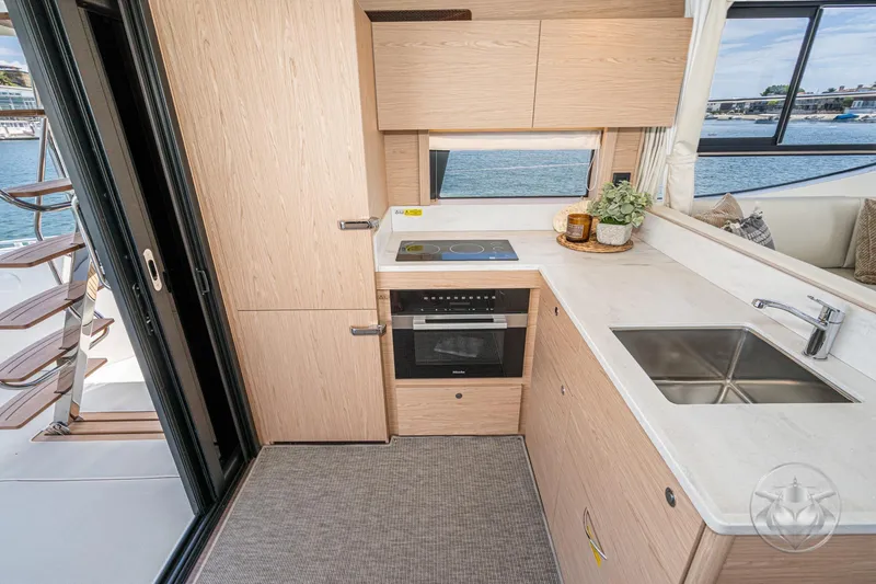 Slide: The Image of Modern kitchen interior of 2026 Beneteau Swift Trawler 48 with sleek design and ocean view. - 36