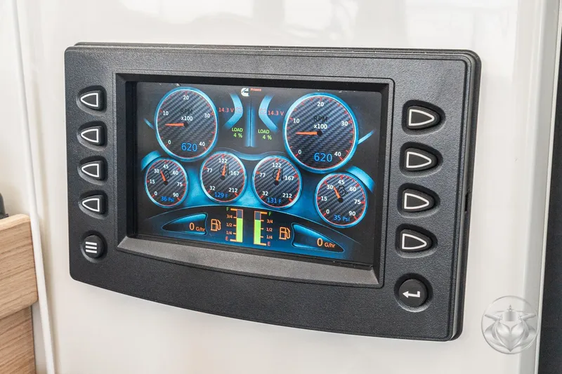 Slide: The Image of Dashboard display of 2026 Beneteau Swift Trawler 48, showing engine metrics and controls. - 49